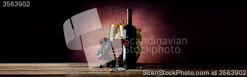 Image of Wine with grape in basket