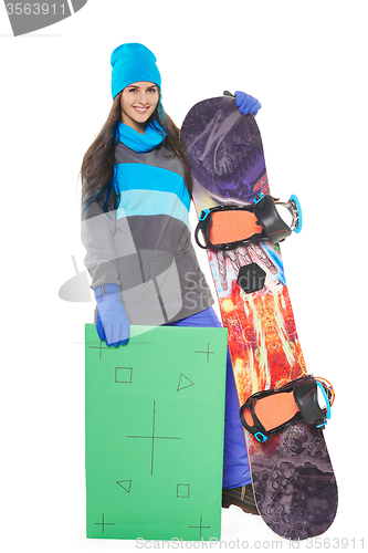 Image of Woman with a snowboard