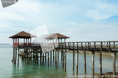Image of Indonesian landscape with walkway and sea