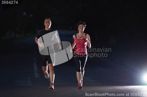 Image of couple jogging at early morning