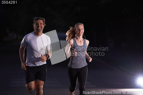 Image of couple jogging at early morning