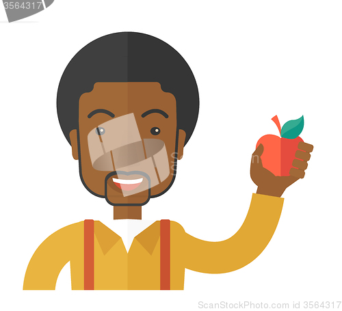 Image of Man holding apple.