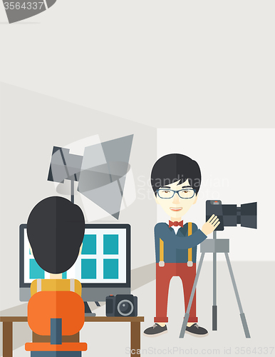Image of Photographers in studio.