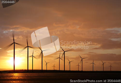 Image of windpower on sunset