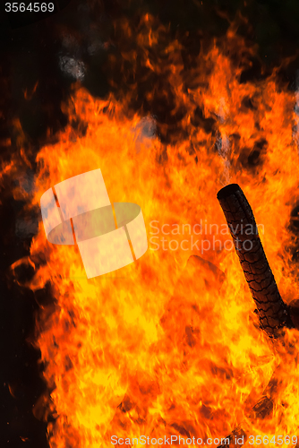 Image of Wooden house on fire