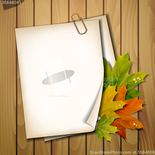 Image of Paper sheet with autumn leaves