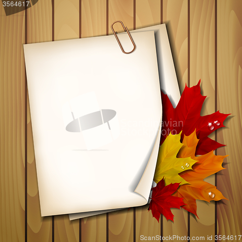 Image of Paper sheet with autumn leaves