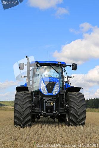 Image of New Holland T7.250 Tractor on Stubble Field, Vertical View