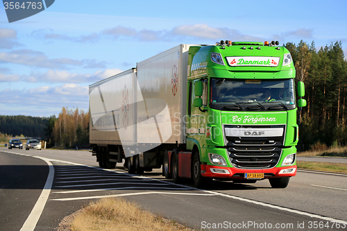Image of Lime Green DAF XF Full Trailer Truck on Motorway