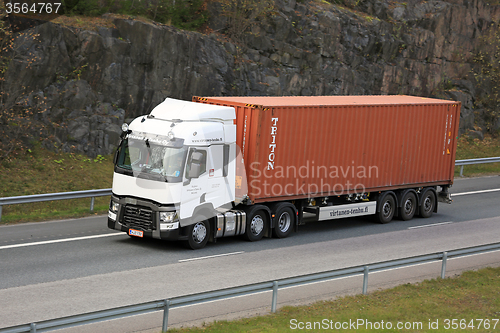 Image of White Renault Trucks T Hauls Intermodal Container