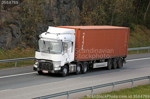 Image of White Renault Trucks T Hauls Intermodal Container