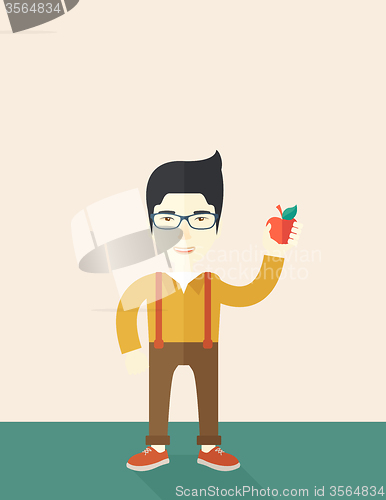 Image of Man holding apple.