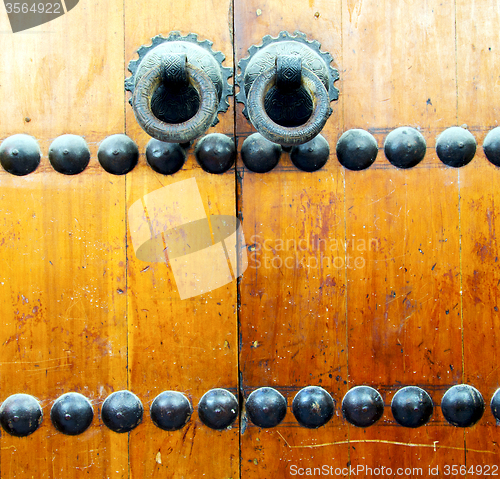 Image of brown  morocco in africa the old wood  facade home and rusty saf
