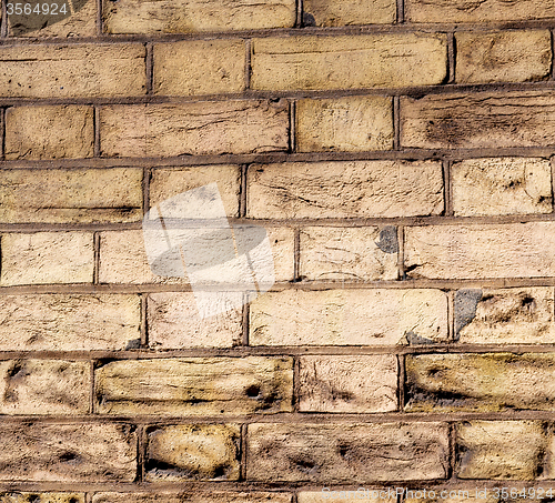 Image of in london abstract    texture of a ancien wall and ruined brick