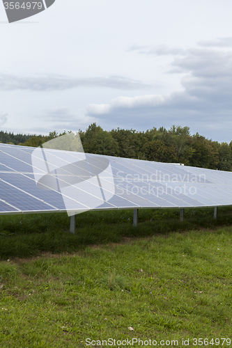 Image of Field with blue siliciom solar cells alternative energy