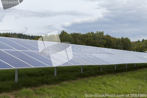 Image of Field with blue siliciom solar cells alternative energy