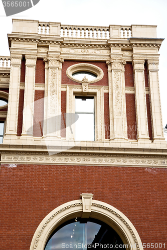 Image of window in europe london old red brick wall  