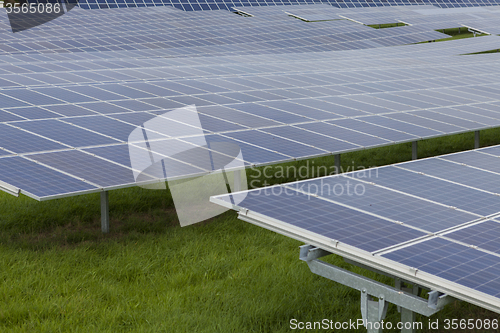 Image of Field with blue siliciom solar cells alternative energy