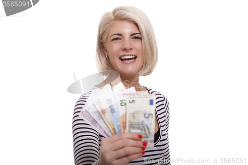 Image of Smiling woman holding a handful of Euro notes