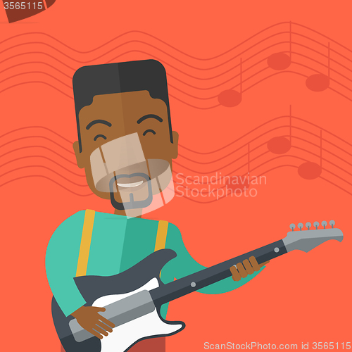 Image of Musician playing electric guitar.