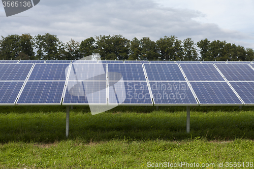 Image of Field with blue siliciom solar cells alternative energy