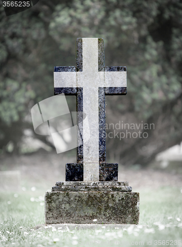 Image of Very old gravestone in the cemetery