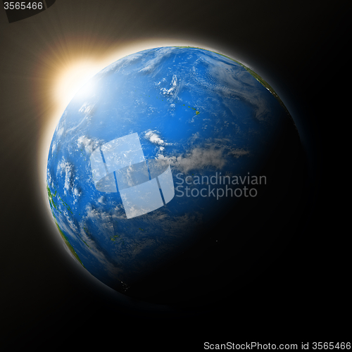 Image of Sun over Pacific Ocean on planet Earth