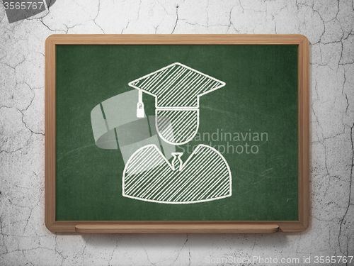 Image of Science concept: Student on chalkboard background