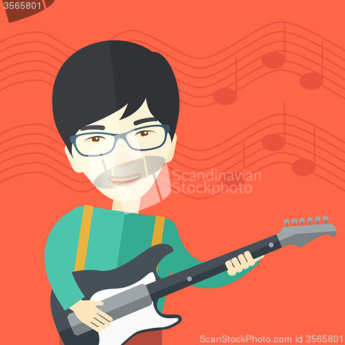 Image of Musician playing electric guitar.