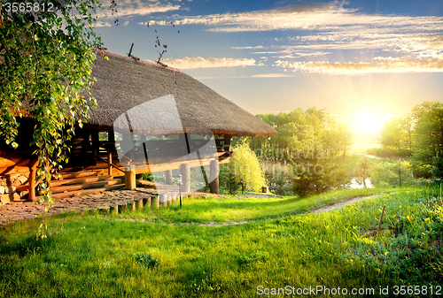 Image of House of log near lake