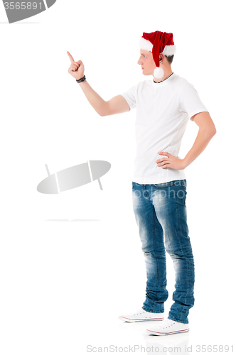 Image of Young man in Santa hat