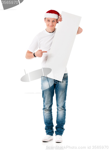 Image of Young man in Santa hat