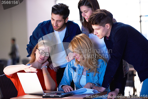 Image of students group working on school  project  together