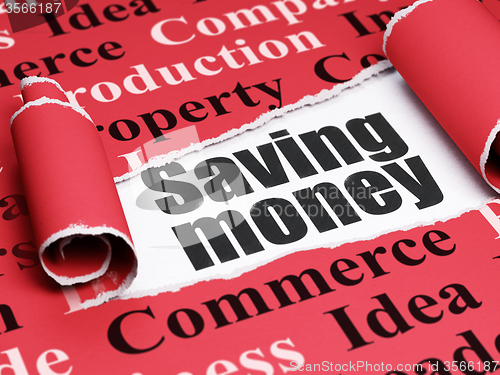 Image of Finance concept: black text Saving Money under the piece of  torn paper