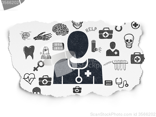 Image of Medicine concept: Doctor on Torn Paper background