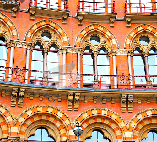 Image of old architecture in london england windows and brick exterior   