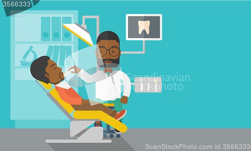 Image of Patient and dentist.