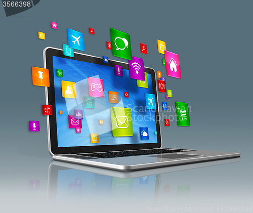 Image of Laptop Computer and flying apps icons on a grey background