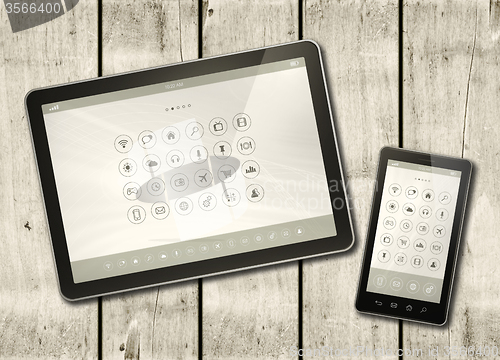 Image of Smartphone and digital tablet PC with desktop icons on a white w