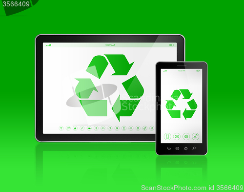 Image of Digital tablet PC with a recycling symbol on screen. ecological 