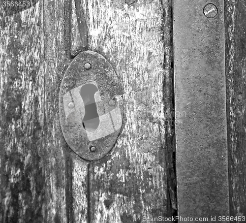 Image of  traditional   door    in italy   ancian wood and traditional  t