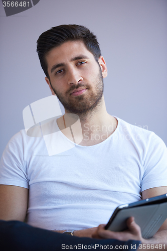 Image of student working on tablet