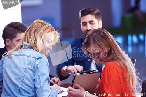 Image of students group working on school  project  together