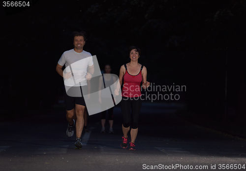 Image of couple jogging at early morning