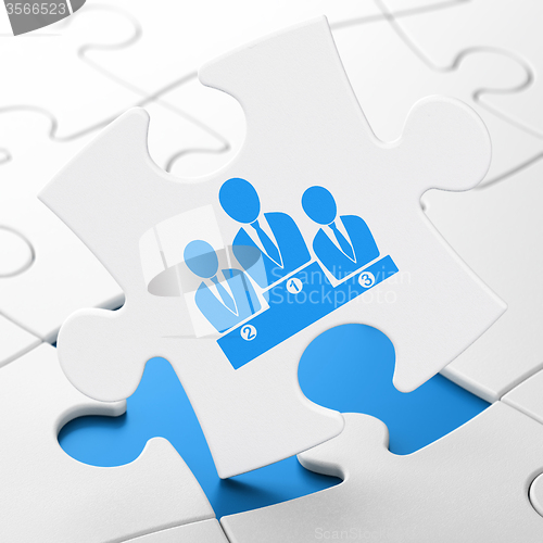 Image of Business concept: Business Team on puzzle background