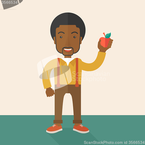 Image of Man holding apple.