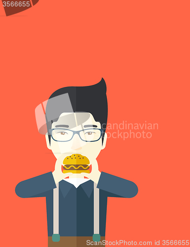 Image of Man eating hamburger. 