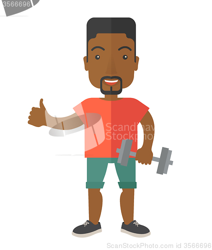 Image of Men standing with dumbbell.