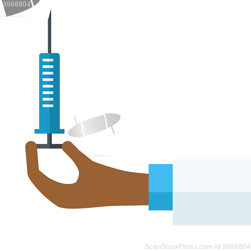 Image of Hand holding syringe.