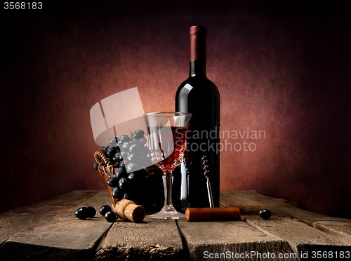 Image of Grape in basket with wine